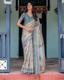 Icy Blue Handloom Cotton Saree with Peach Elephant Motifs & Royal Procession Pallu