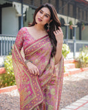 Regal Pink Handloom Cotton-Linen Saree with Floral Motifs, Golden Zari Highlights, and Tassel Detailing