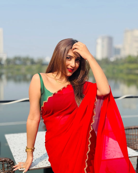 Elegant Red Saree with Golden Handwork Border & Green Blouse – Festive & Party Wear