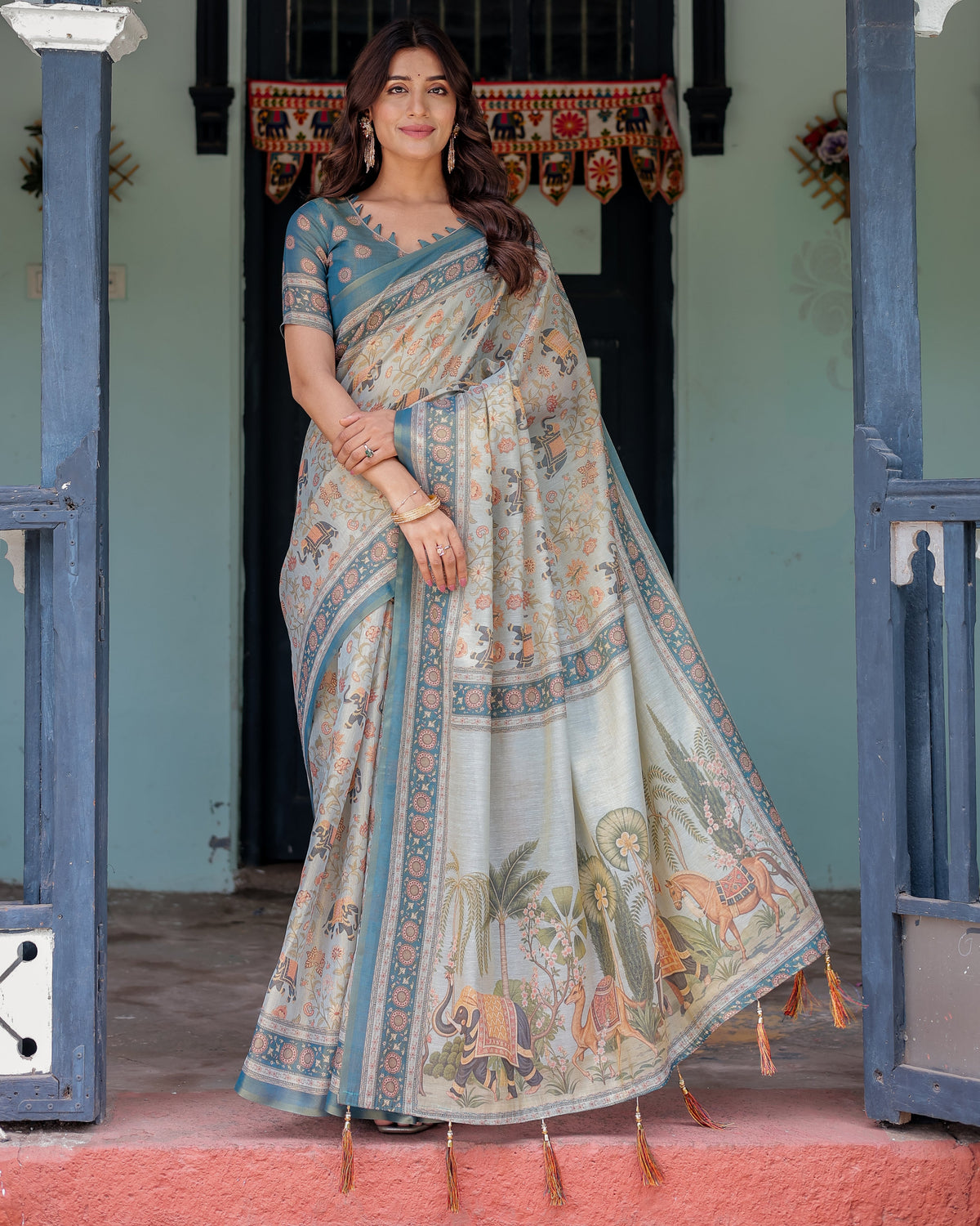 Icy Blue Handloom Cotton Saree with Peach Elephant Motifs & Royal Procession Pallu
