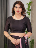 Black Satin Georgette Floral Printed Saree with Soft Pink Border & Attached Blouse – Elegant Designer Partywear Drape
