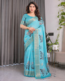 Turquoise Blue Handloom Linen Saree with Floral Digital Print & Golden Zari Border | Tassel Detailing | Attached Blouse | 5.5m Saree + 0.8m Blouse