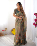 Teal Green Handloom Cotton Saree with Floral Print and Royal Elephant Pallu